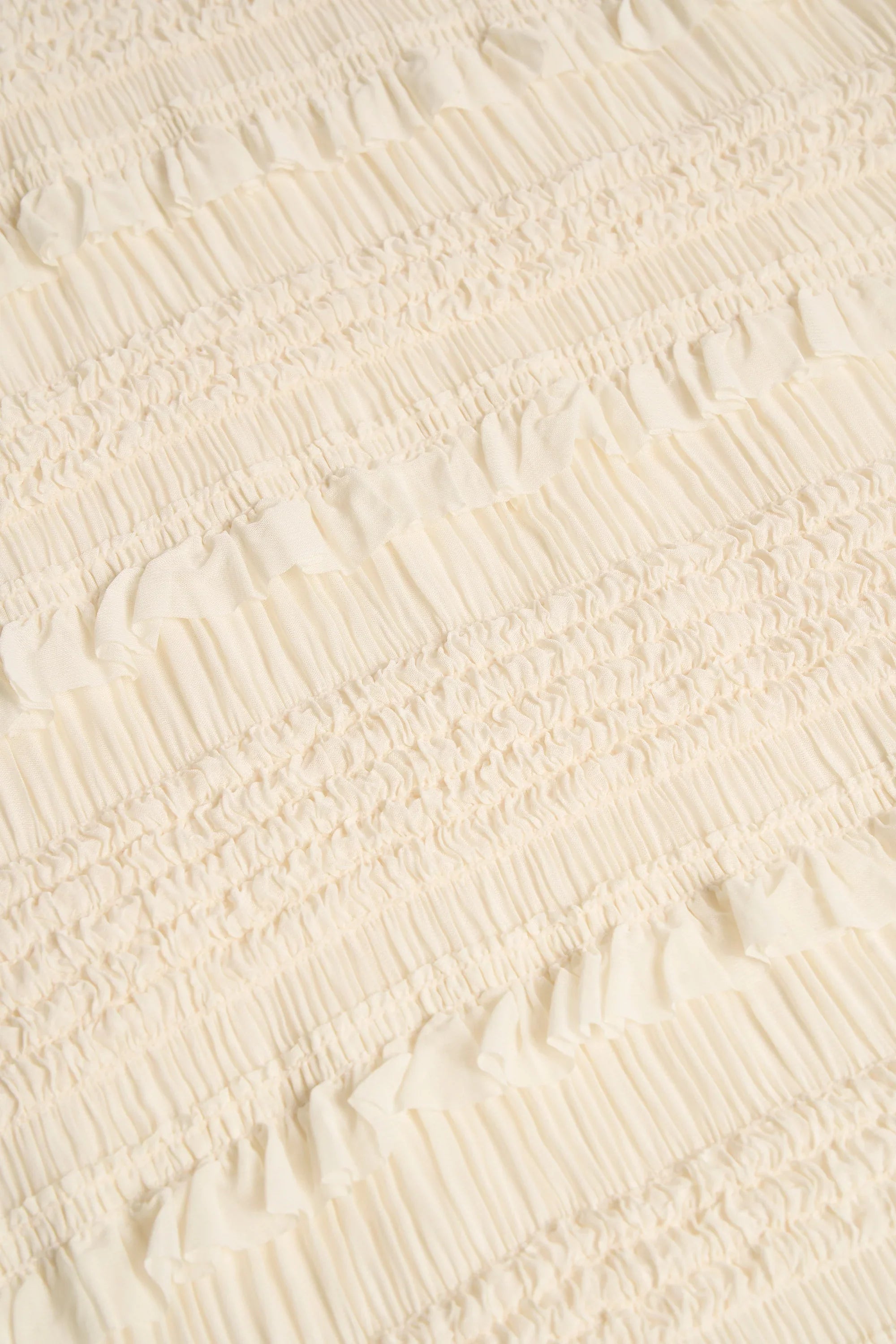Ruffled High-Neck Backless Top in Ivory