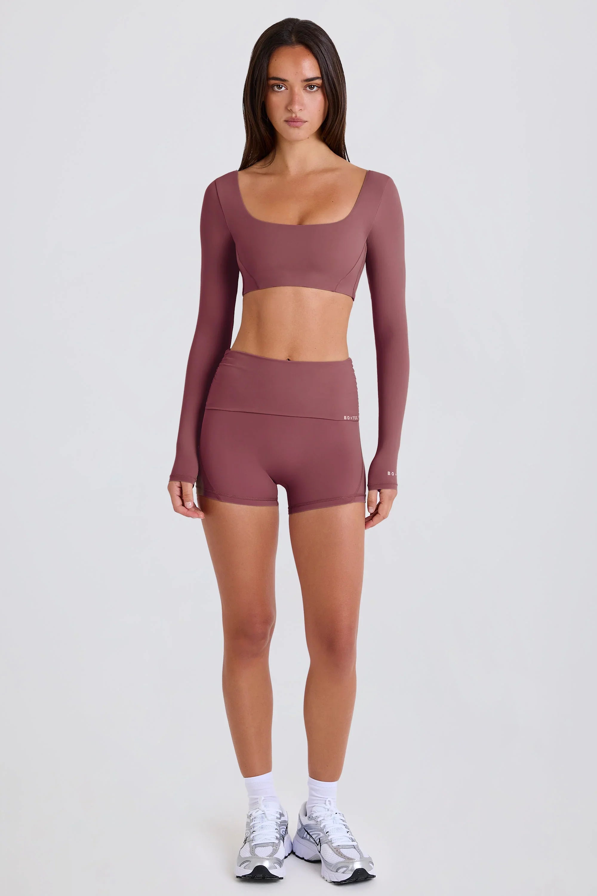 Four-Way Stretch Foldover Mid-Rise Mini Shorts in Acai